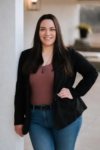 Image of a woman wearing a black jacket